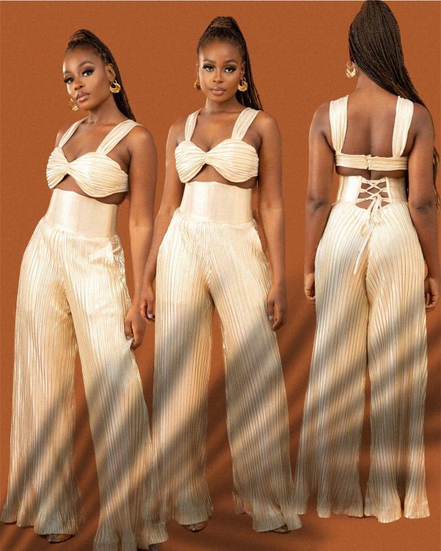 Oma set 

 Details 
- Pleated silk satin fabric 
- Bralette 
- High waisted, corseted trousers 
- can be purchased separately 
Available to shop on www.shopmalite.com in at 6pm today
